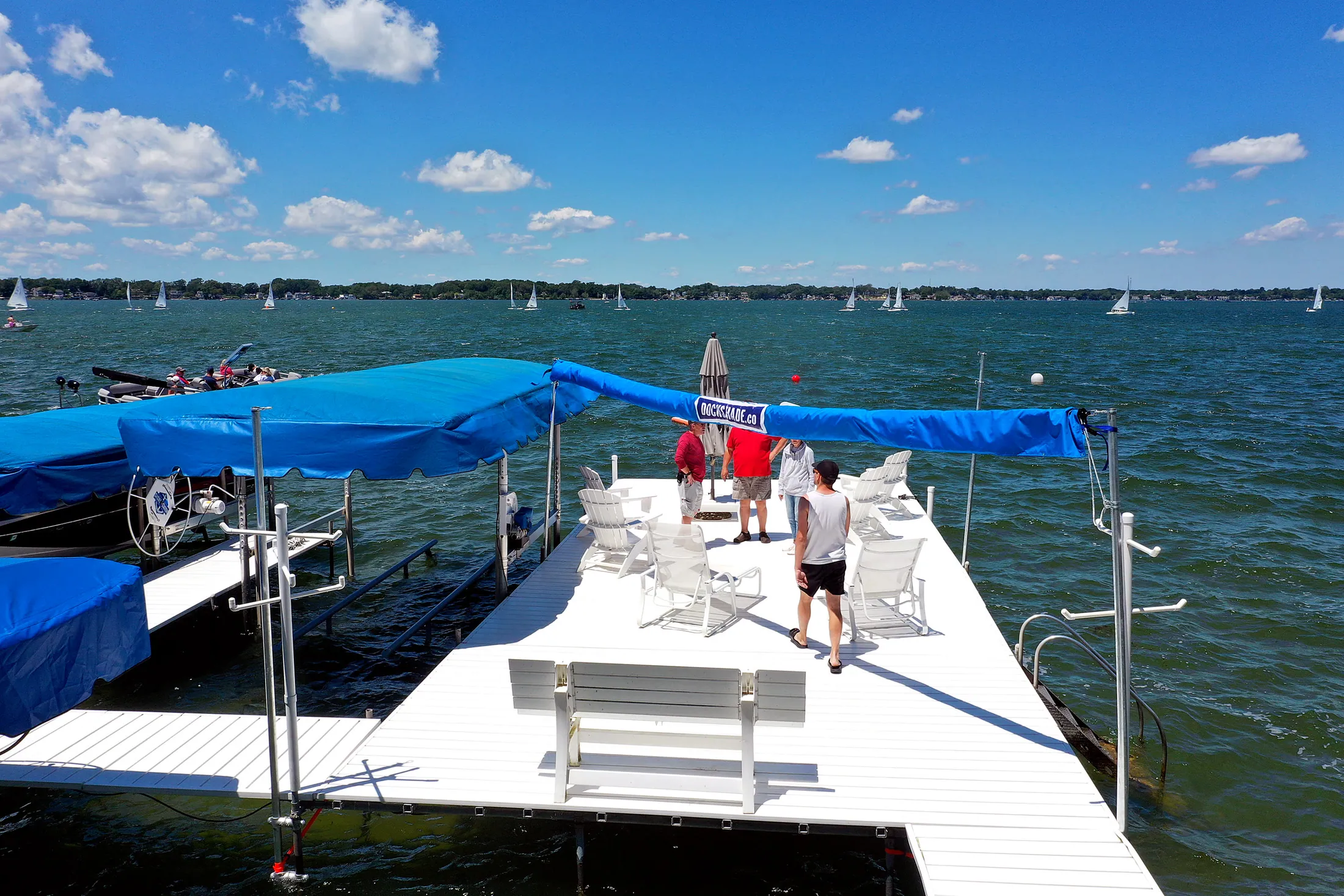 Real DockShade installation with the shade furled and the dock seating area open