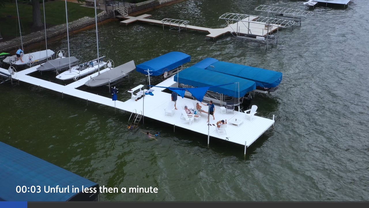 DockShade open above a seating area on the lake